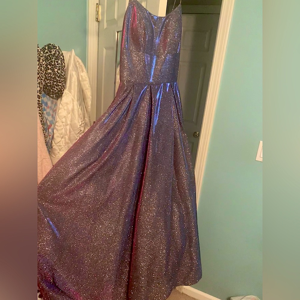 Brand new tags on Betsy Adam (Macy’s) shiny purple gown size6, large poofy skirt